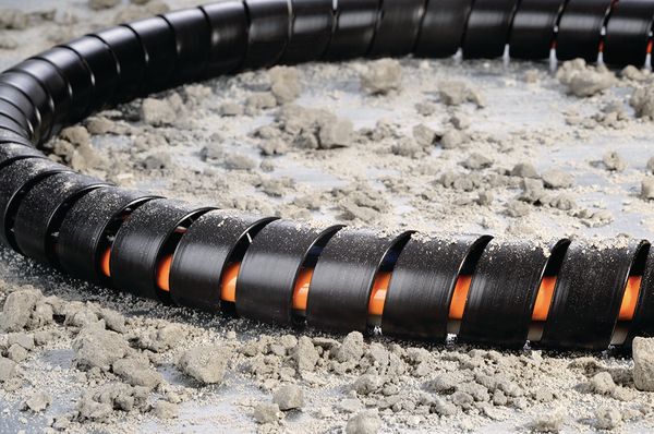 Spirale per cavi a parete spessa per linee idrauliche nelle macchine da costruzione