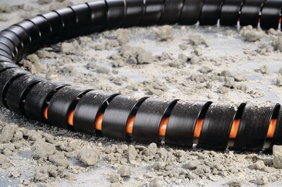 Spirale per cavi a parete spessa per linee idrauliche nelle macchine da costruzione