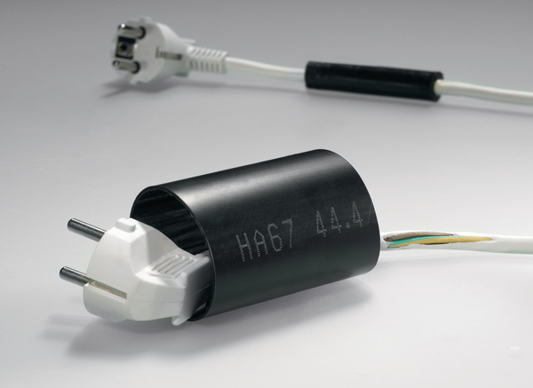 Guaina termorestringente (6:1) in combinazione con una spina di alimentazione